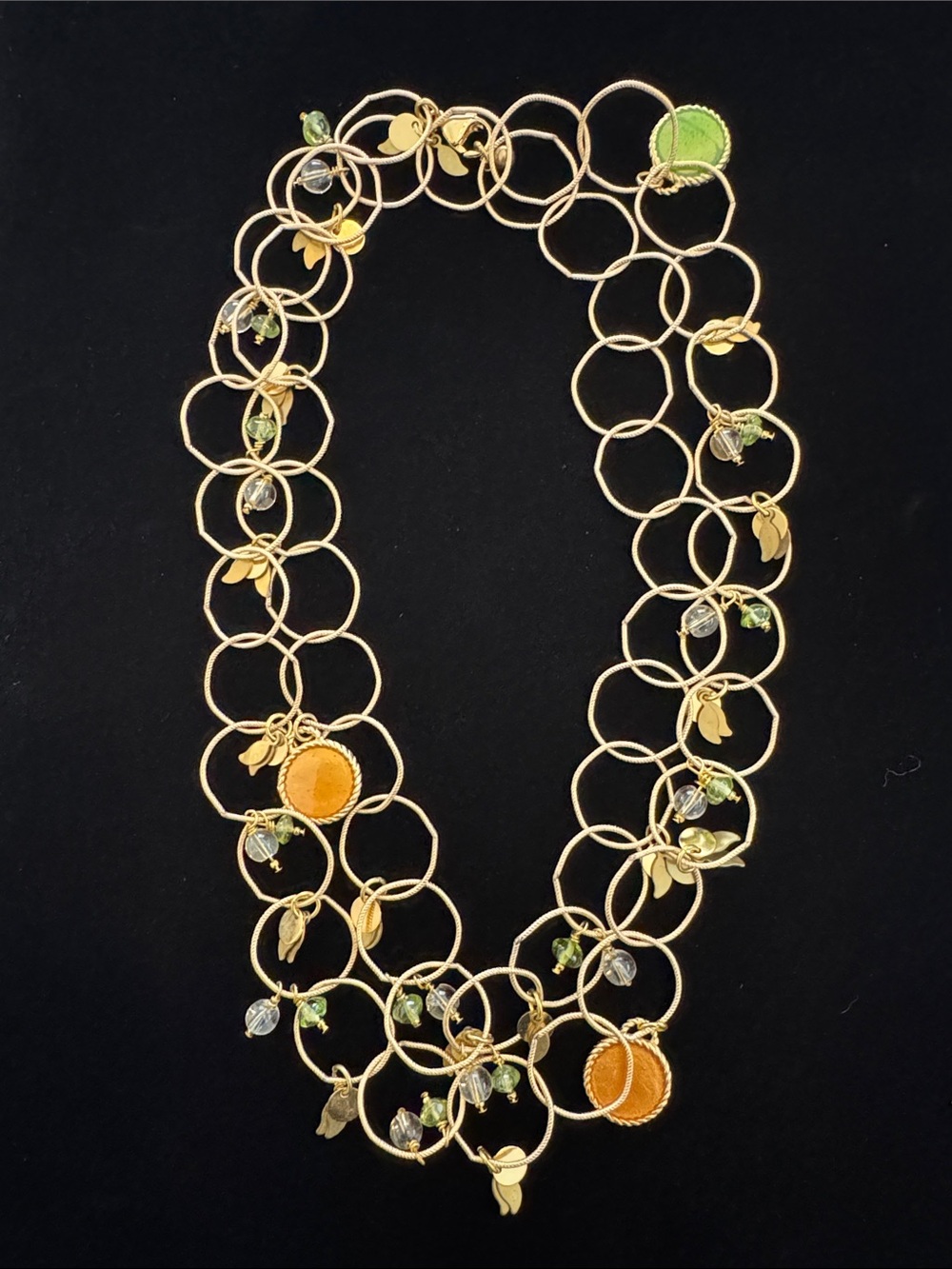 Gold-Tone Multi Ring Long Necklace with Green & Orange Circle Accents
